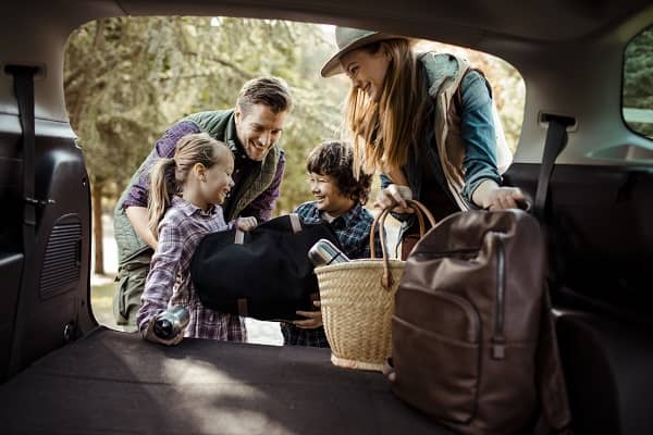 Packing up vehicle for family vacation