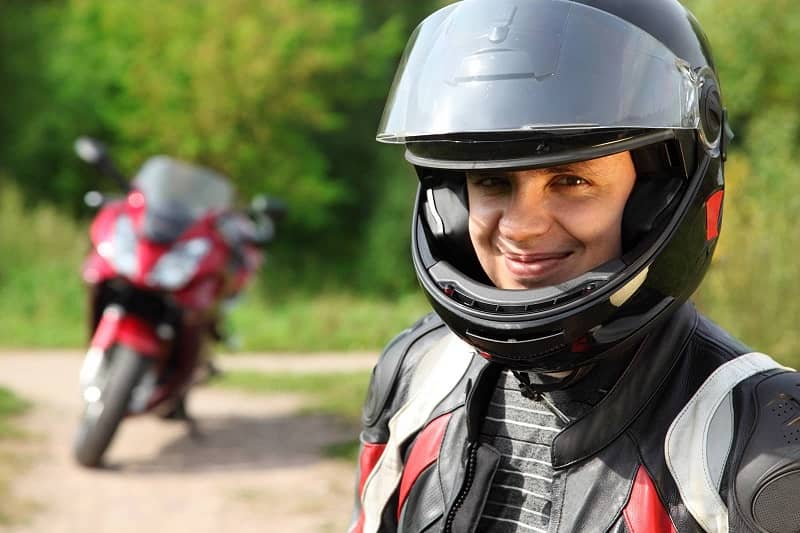 Smiling motorcyclist