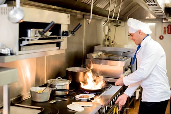 Chef Cooking in Restaurant